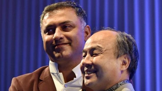 图注：软银总裁NikeshArora和首席执行官MasayoshiSon。©法新社